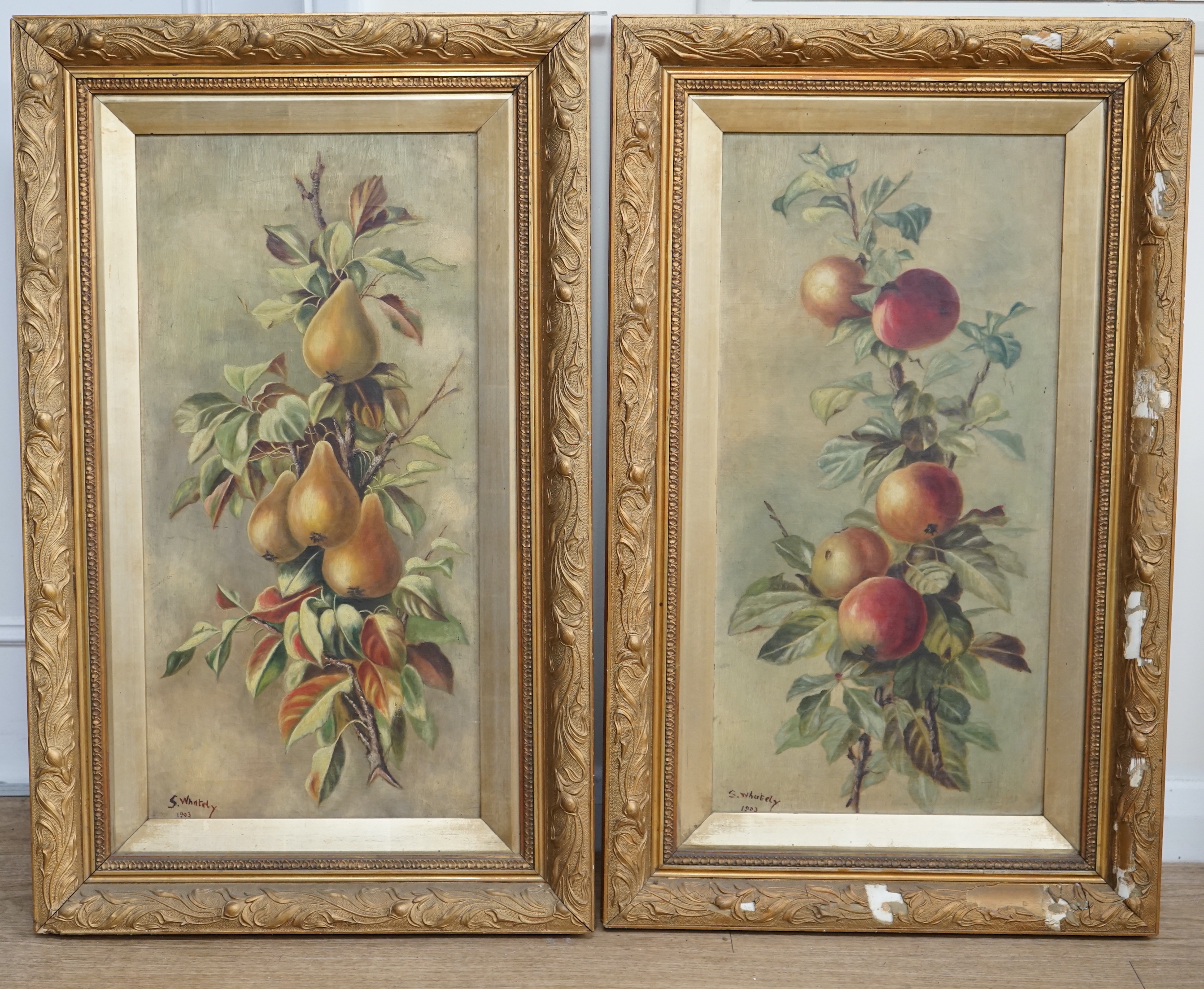 S. Whately, pair of oils on canvas, Still lifes of apples and pears, signed and dated 1903, 59 x 29cm